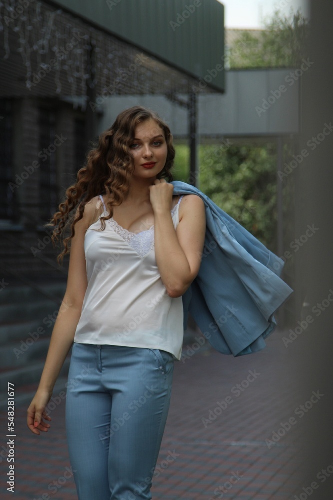 Fototapeta premium woman sitting on the steps