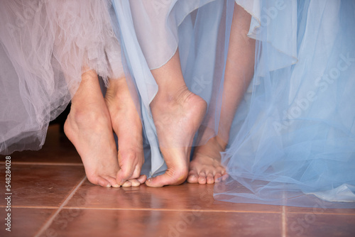 feet of two ballet dancers