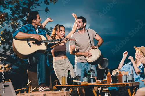 Canvas Print summer party camping of friends group with guitar music, happy young woman and s