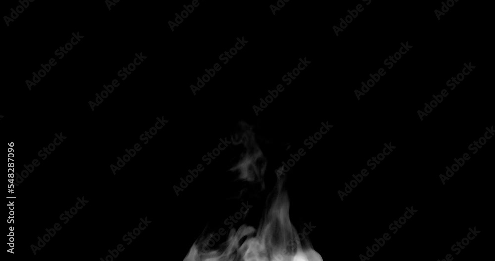 White steam isolated on black. Trickle of Steam Slowly Rising from the Cup. White steam rises graceful twists on a black background. Footage is perfect for the layer with different blending modes. White steam isolated on black. Trickle of Steam Slowly Rising from the Cup. White steam rises graceful twists on a black background. Footage is perfect for the layer with different blending modes.