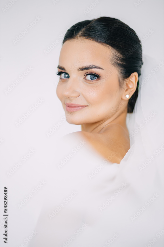 Sensual morning preparation of a young beautiful bride. Wedding. Bride's preparations in the home interior. Sensual morning preparation of a young beautiful bride. Wedding. Bride's preparations in the home interior.