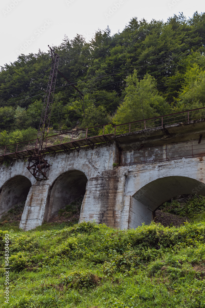 Old railway bridge in the mountains. Carpathians view Old railway bridge in the mountains. Carpathians view