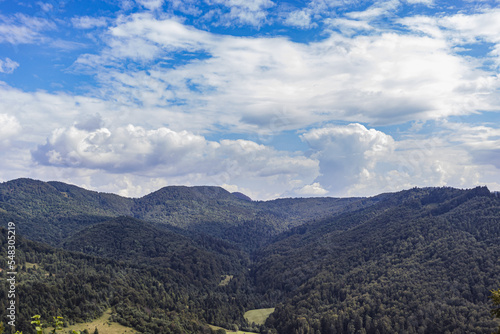 Majestic view on beautiful Carpathian mountains in mist landscape. Dramatic unusual scene. Mountain Travel background