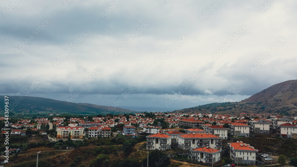 View of the city of Gökçeada in a rainy day, Imbros Island Canakkale Turkey. It is the largest island in Turkey, in the north-northeast of the Aegean Sea.