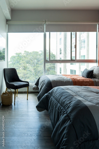 фотографія Hotel airbnb room with freshly made king sized bed with headboard, perfectly cle