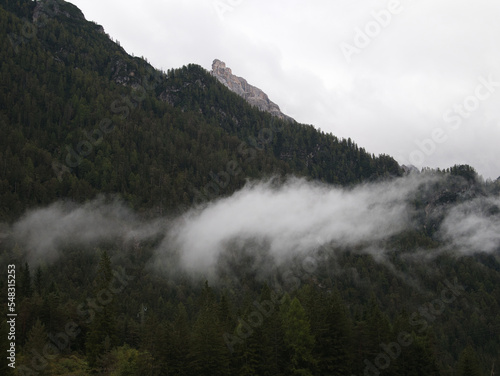 Autumn morning after the rain by the lake of Dobbiaco Toblacher See . South Tyrol  province of Bolzano. Dolomites  Italy.