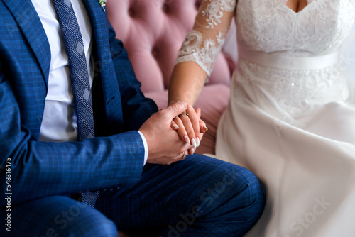 Wedding rings on hands close-up © Vitaliy Rutchin