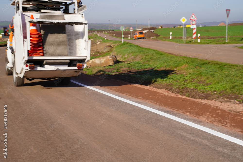 Road marking on a construction site bypass of the A143 near ...