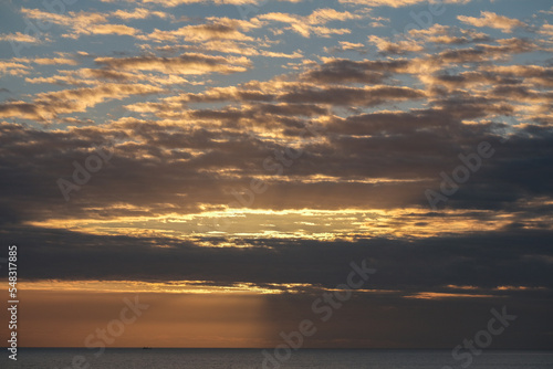 Beautiful horizon sunrise sunset dusk dawn twilight blue hour over ocean sea with sea gulls nature seascape scenery © Tamme