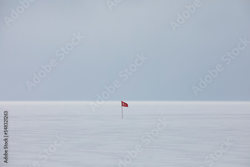 Turkish Flag in the Winter Background, Cildir Lake Ardahan, Turkey