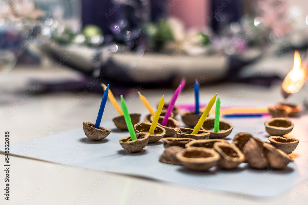 christmas custom and tradition in eastern Europe, preparation of nutshells with candles christmas custom and tradition in eastern Europe, preparation of nutshells with candles