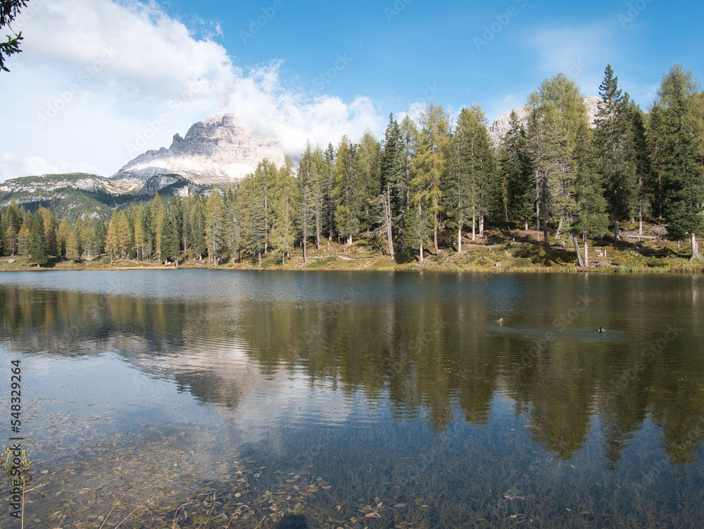 Fototapeta premium A sunny autumn day along Lake Antorno, Dolomites, Italy.