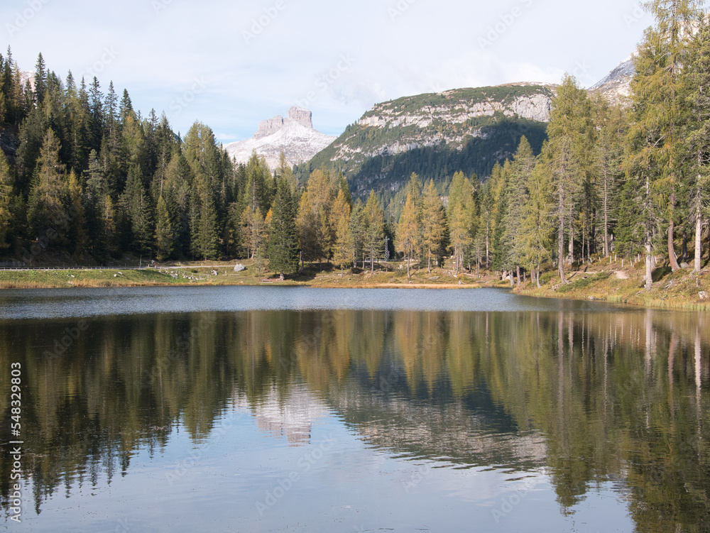 A sunny autumn day along Lake Antorno, Dolomites, Italy. A sunny autumn day along Lake Antorno, Dolomites, Italy.