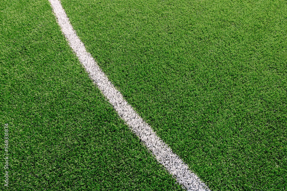 Texture of Perfect green lawn on the football field Texture of Perfect green lawn on the football field