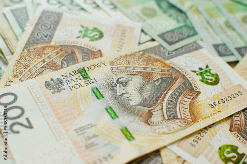 Fototapeta premium Polish banknotes - paper currency background.