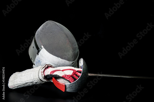 fencer athlete with old mask old glove and old sword