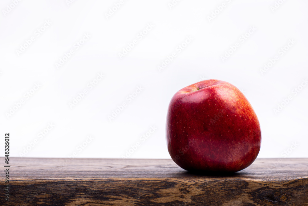 Apples on a white background. Fruits on the kitchen board. Apples on a white background. Fruits on the kitchen board.