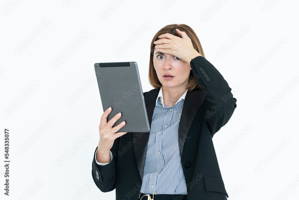 Shocked businesswoman holding planchet and depressing after bad financial news isolated on white background Shocked businesswoman holding planchet and depressing after bad financial news isolated on white background