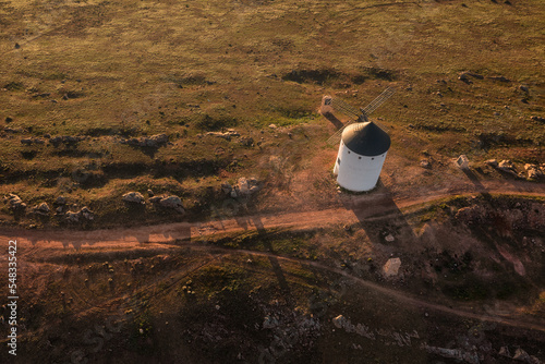 Windmills. These iconic towers over their skylines of la Mancha. 