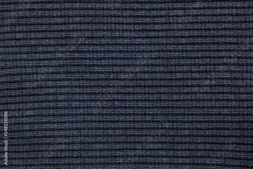 Blue finely knitted fabric background