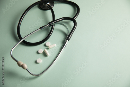 Medical stethoscope and pills
