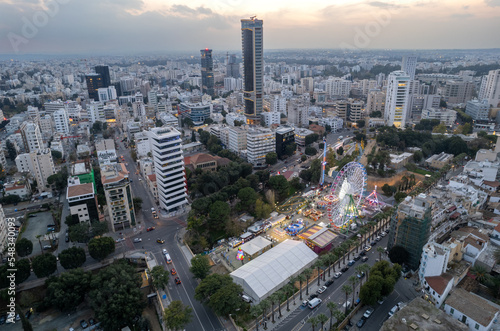 Aerial drone cityscape of nicosia capital city of cyprus.  Amusement park at Christmas