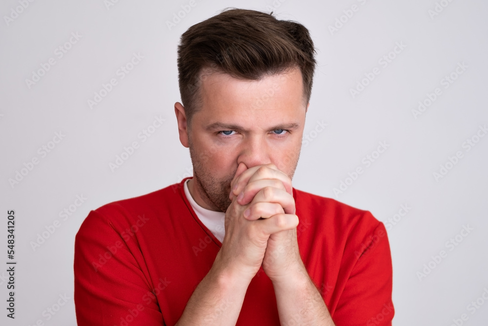 Gloomy caucasian man frowns face, looking with a doubt, having no idea. Gloomy caucasian man frowns face, looking with a doubt, having no idea.