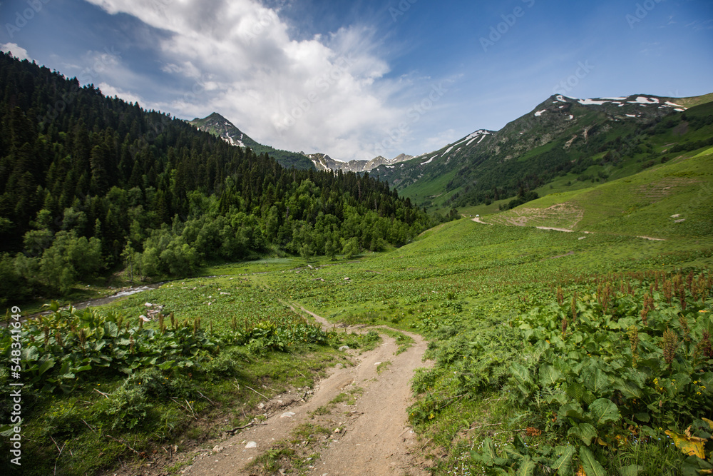Fototapeta premium Fabulous magnificent view of Caucasus Mountains and sky. High quality photo