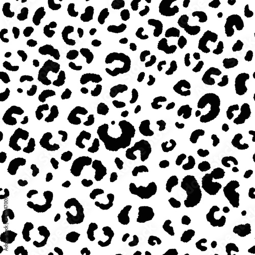 Abstract modern leopard seamless pattern. Animals trendy background. Black and white decorative vector illustration for print, card, postcard, fabric, textile. Modern ornament of stylized skin