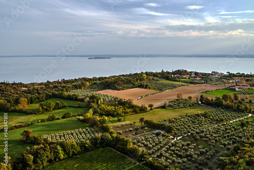 Aerial view of farmland, forest and Lake Garda