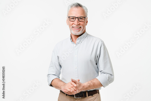 Happy mature middle-aged senior businessman teacher grandfather freelancer college professor wearing glasses isolated in white background photo