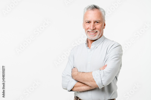 Confident caucasian middle-aged senior businessman freelancer ceo grandfather teacher professor boss in formal attire with arms crossed isolated in white background