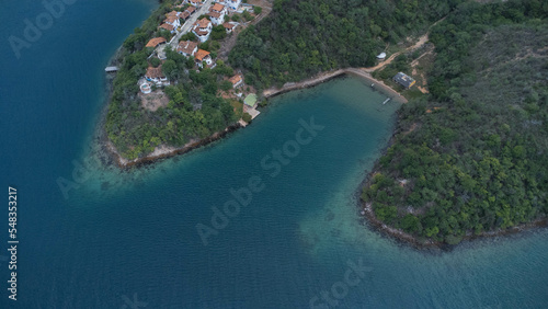 Photos with drone of the coast of the Gulf of Cariaco in the Sucre State. You can see the beaches, coasts, hills and buildings, hotels, residential complexes, Gulf of Cariaco, waves, nearby hotels and