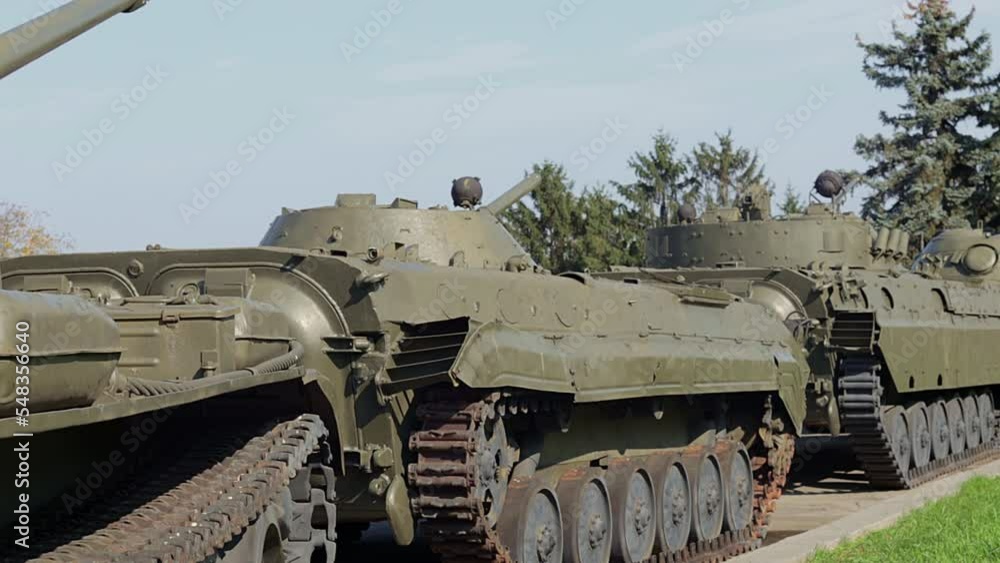 A column of armored vehicles and tanks. National Armed Forces. Military equipment and troops. War in Ukraine. Building or building combat vehicles. Armored weapons. means of the armed forces. A column of armored vehicles and tanks. National Armed Forces. Military equipment and troops. War in Ukraine. Building or building combat vehicles. Armored weapons. means of the armed forces.