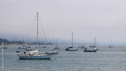 Sailboats standing in front of the coast of Santa Barbara, California, near Stearns Wharf. © StandbildCA
