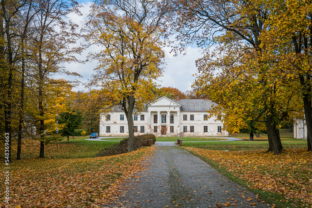 Autumn landscape and estate mansion