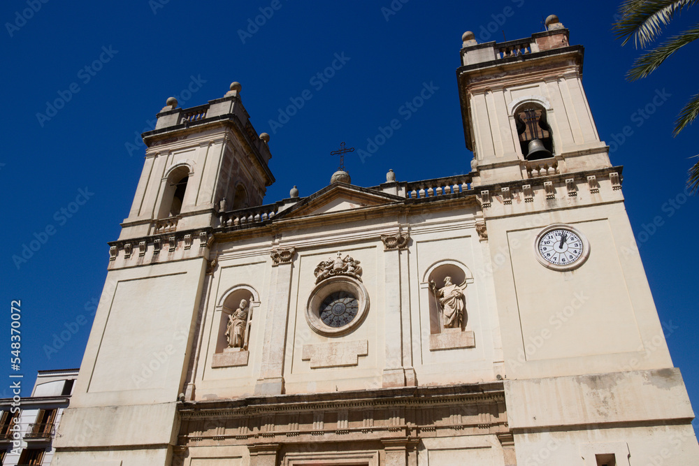Facade of the Sant Pere Apostol Parish in the city of Benifaió in the province of Valencia (Spain)