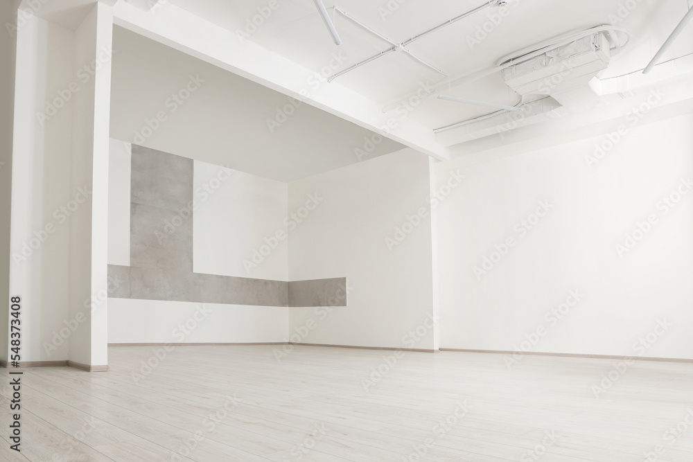 Empty office room with white walls and ventilation system. Interior design Empty office room with white walls and ventilation system. Interior design