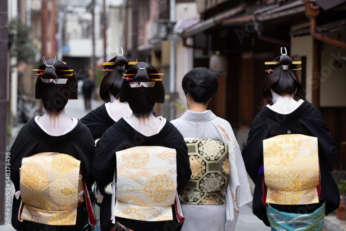 Fotografia, Obraz Traditional geisha out and about walking in Gion Kyoto Japan .