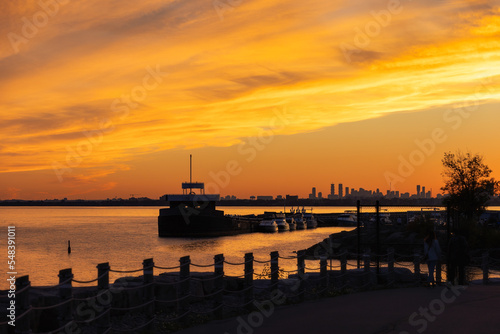 Vibrant warm sunset over a marina. Ontario Place : Toronto Canada © Scott Heaney