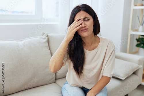 Free Download Woman sitting on sofa at home pain in nose and throat, cold and allergy, covid-19 disease, temperature - GFXLoad