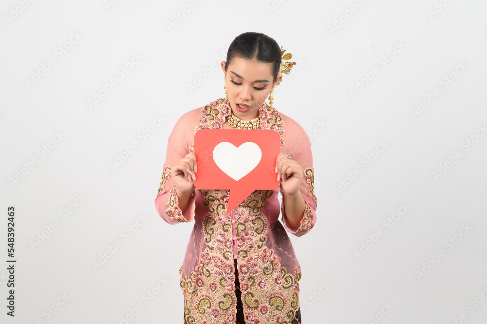 Young beautiful woman dress up in local culture in southern region with speech bubble Young beautiful woman dress up in local culture in southern region with speech bubble