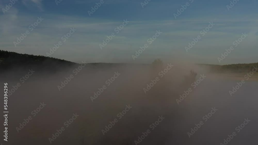 flying with drone over a lake through the fog foggy landscape flying with drone over a lake through the fog foggy landscape