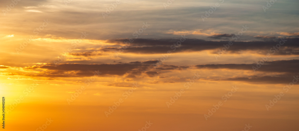 orange sky backdrop  dark clouds at dusk  website background design template