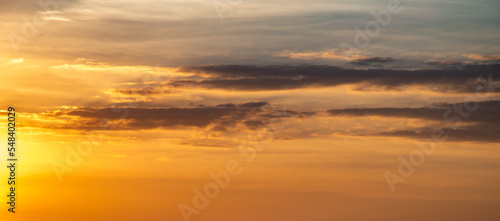 orange sky backdrop  dark clouds at dusk  website background design template © Supat suttiso