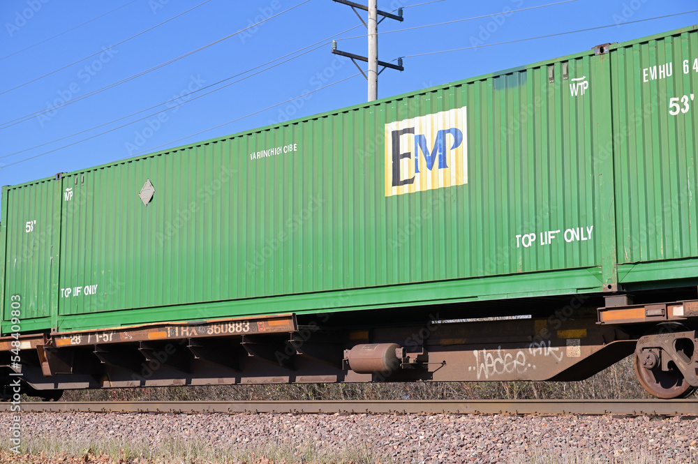An intermodal freight train passing through northeastern Illinois. The