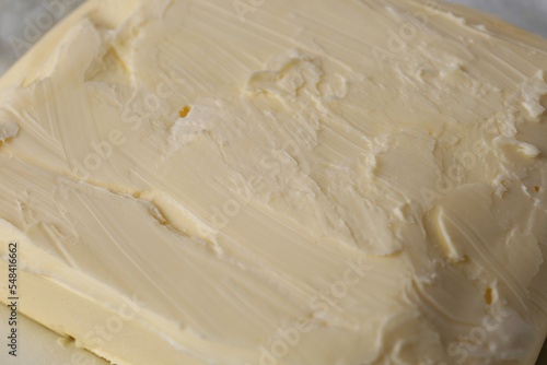 Piece of tasty homemade butter as background, closeup