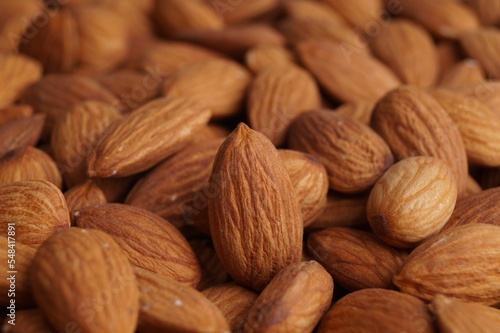 Pile of delicious raw ripe almonds, closeup