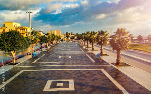 Aerial view of Mazara del Vallo city promenade along the ocean, beautiful coast of Sicily at sunset from drone.