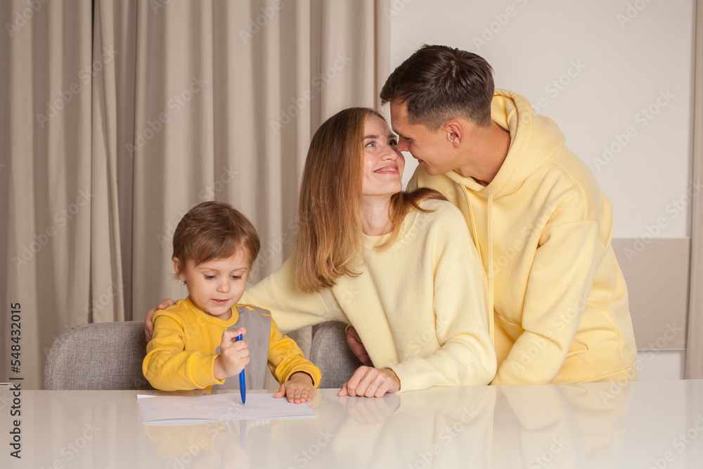 Lovely cute family, parents with son painting Lovely cute family, parents with son painting